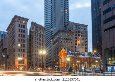 Boston, MA, USA - December 17, 2016: Old State House and the skyscrapers of the Financial District at night in Boston, Massachusetts, USA