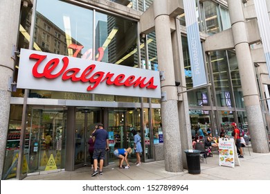 BOSTON, MA, USA - JULY 12, 2019: Walgreens store exterior and signs in Boston. Walgreens is the largest drug retailing chain in the United States.