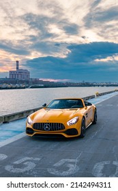 Boston, MA, USA - March 15, 2022: Yellow Mercedes AMG GTC