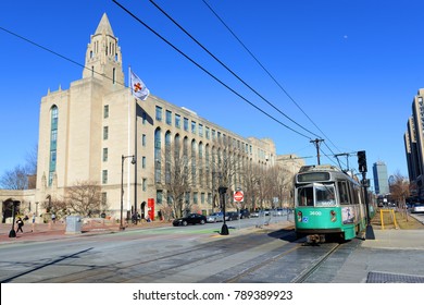 BOSTON - MAR. 29, 2015: Boston Metro MBTA Kinki Sharyo Type 7 Green Line in front of College of Arts and Sciences of Boston University, Boston, Massachusetts, USA.
