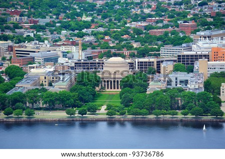Boston Massachusetts Institute of Technology campus with trees and lawn aerial view with Charles River