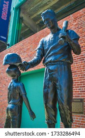 Boston, Massachusetts - May 25, 2018: The Ted Williams Jimmy Fund Statue Located Outside The Gate B Entrance To Fenway Park.