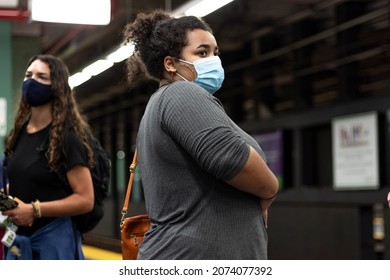 Boston, Massachusetts - September 17, 2021: People Wait For The Train On The Boston Transit System. 