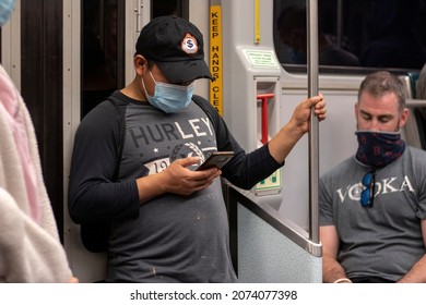 Boston, Massachusetts - September 17, 2021: People Wait For The Train On The Boston Transit System. 