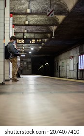 Boston, Massachusetts - September 17, 2021: People Wait For The Train On The Boston Transit System. 