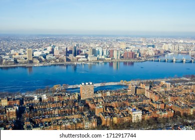 Boston, Massachusetts /United States-12/20/2019: aerial view of cityscape of beacon hill and cambridge on the banks of Charles river 