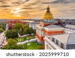 Boston, Massachusetts, USA cityscape with the State House at dusk.