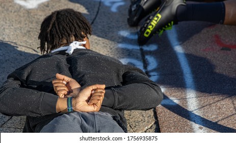 Boston, Massachusetts (USA)- June 14, 2020. The Association Of The Pakistanis Physician Met At The Boston Public Library To Request Justice For George Floyd. A Black Male Is Laying On The Ground