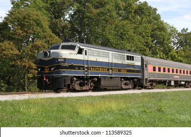 BOSTON MILLS, OHIO - SEPT. 15: Baltimore & Ohio Diesel Locomotive Pulling The Cuyahoga Valley Scenic Railroad Passenger Train, Heading North, On Sept. 15, 2012 Near Boston Mills, Ohio