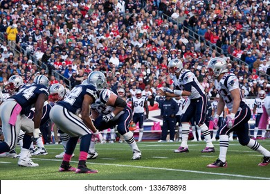 BOSTON - OCTOBER 16: Quarterback Tom Brady, No 12, takes hike at Gillette Stadium, New England Patriots vs. Dallas Cowboys on October 16, 2011 in Foxborough, Boston, MA