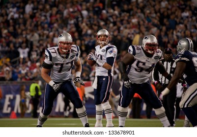 BOSTON - OCTOBER 16: Quarterback Tom Brady, No 12, prepares to throw pass at Gillette Stadium, New England Patriots vs. Dallas Cowboys on October 16, 2011 in Foxborough, Boston, MA