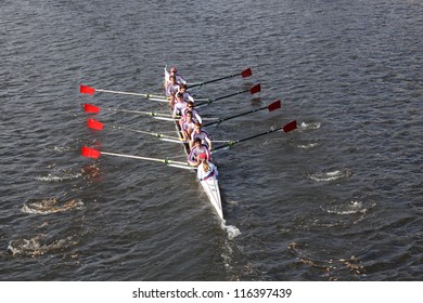 BOSTON - OCTOBER 21: St Catharines Rowing Club races in the Head of Charles Regatta, Marin Rowing Association won with a with a time of 12:59 on October 21, 2012 in Boston, MA. - Shutterstock ID 116397439