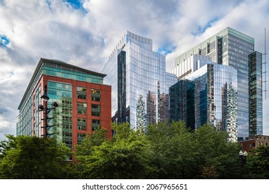 Boston Skyline and Cityscape over the green park. Abstract architectural geometry of modern buildings in downtown Boston, Massachusetts.