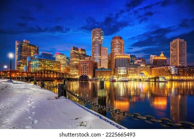 Boston skyline, financial district and harbor at winter night - Shutterstock ID 2225665493