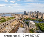 Boston stock photo 2024. Aerial view of rivers, bridges, office buildings and harbor.