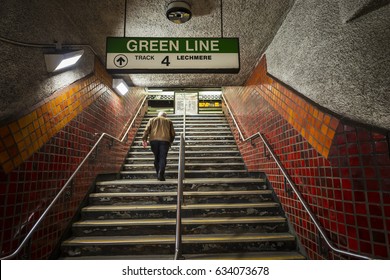 Boston Subway (Massachusetts Bay Transportation Authority, MBTA). An Adult Is Going Out Of The Subway Station, Located In Boston, Massachusetts, USA.