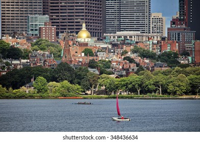 Boston, US - August 24, 2015: Boston Charles River with urban skyscrapers and boat