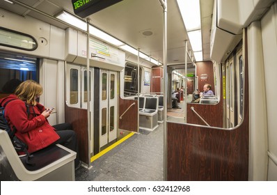 Boston, USA - April 24, 2017: People In Boston Subway (Massachusetts Bay Transportation Authority, MBTA), Located In Boston, Massachusetts, USA.