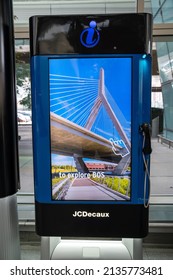 Boston, USA - July 11, 2019 : Advertising on touch screen and Telephone booth public at Logan International Airport in Boston, USA.