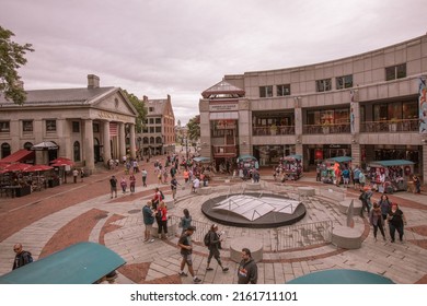 BOSTON, USA - JULY 18 : People visit famous Quincy Market on July 18, 2019 in Boston. Quincy Market dates back to 1825 and is a major tourism destination in Boston.