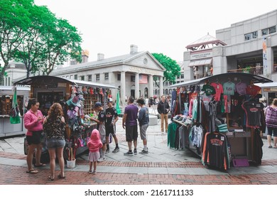 BOSTON, USA - JULY 18 : People visit famous Quincy Market on July 18, 2019 in Boston. Quincy Market dates back to 1825 and is a major tourism destination in Boston.