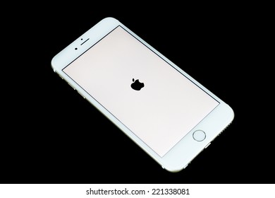 Boston, USA - October 3 2014: iPhone 6 Plus isolated on black background. iPhone is a line of smartphones designed and marketed by Apple Inc.