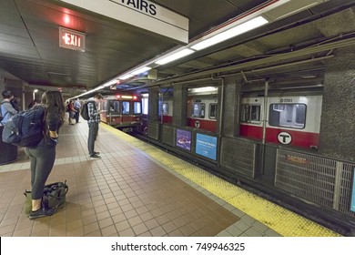 BOSTON, USA - SEP 13, 2017: People Enter The Red Line Train In The Oldest Subway In The US.