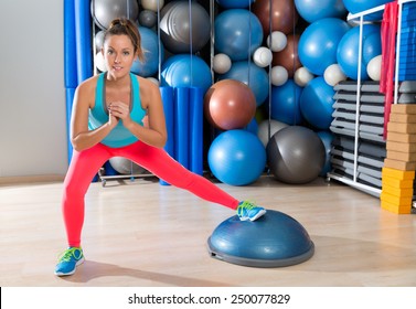 Bosu One Leg Squat Girl Exercise At Gym Workout And Swiss Ball Background