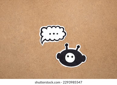 Bot with three dots speech bubble, concept of chatting with bot. Asking question to AI. Bot representation ready to work.