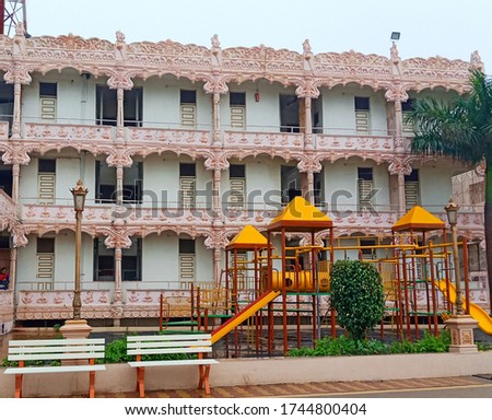 Botad Ahmedabad Gujarat India 30 may 2020 There is a children's play area and a very good temple Garden is yellow and red color inside the gardenEvening time and Green Plant. 