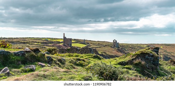 Botallack Tin mines in Cornwall Uk England. . Old tin mine ruins an industry from the past on the cornish coastal path at Old Wheal, also Poldark film location.