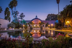 The Botanical Garden In Balboa Park In San Diego, California Is Reflected In The Lily Pond