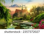 Botanical garden of Wroclaw. View of the cathedral and the lake with lotuses