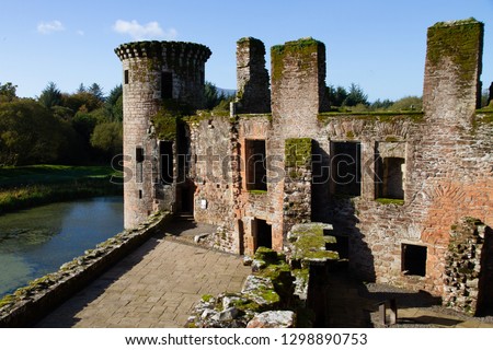 Bothwell Castle, South Lanarkshire, Scotland.  Medieval castle with a moat in autumn sunshine.