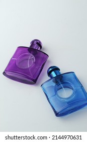 Botol Parfum Or Two Purple And Blue Perfume Bottles Made Of Glass,selective Focus,soft Focus Ang Shinny Texture