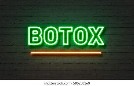 Botox neon sign on brick wall background
