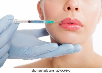 Botox Shot In The Female Cheek,