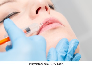 botox woman fillers spa facial young treatment syringe injecting injection skin lips concept - stock image