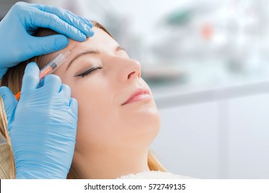 botox woman fillers spa facial young treatment syringe injecting injection skin lips concept - stock image