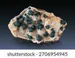 Botryoidal malachite on quartz from Congo.