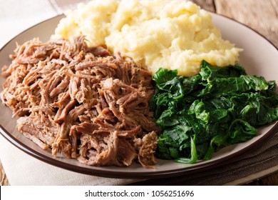 Botswana Food - Seswaa Stewed Beef With Sadza From Corn Flour And Spinach, Close-up On A Plate. Horizontal
