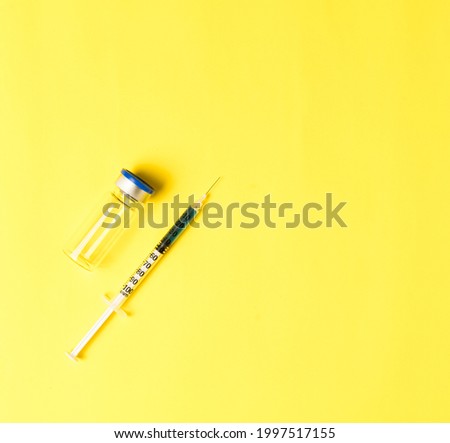 Similar – Medical syringe on colorful background.