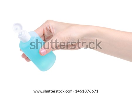 Bottle acetone nail polish remover in hand on white background isolation