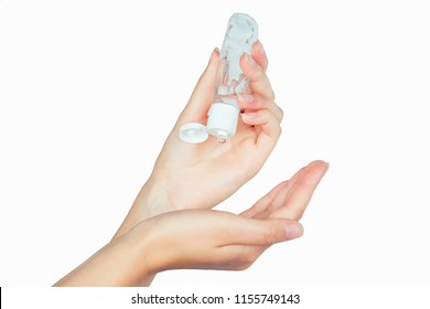 bottle with antibacterial antiseptic gel in hand on white isolate - Shutterstock ID 1155749143