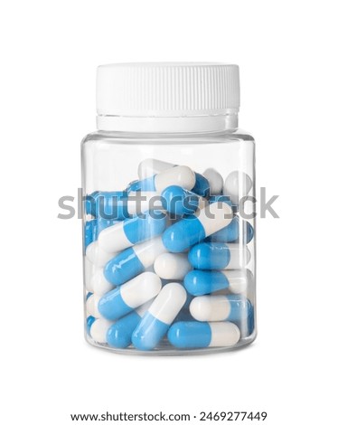 Bottle of antibiotic pills isolated on white. Medicinal treatment