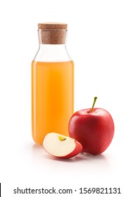 Bottle of apple cider vinegar with fresh red apples isolated on white background