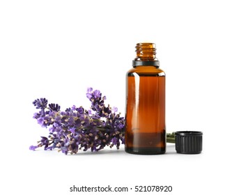 Bottle With Aroma Oil And Lavender Flowers Isolated On White