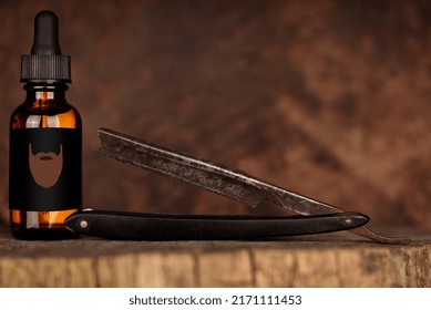 A Bottle Of Beard Oil, An Old Razor. Vintage Style Mockup Oil Beard.