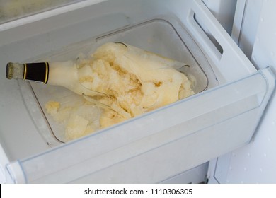 A Bottle Of Beer Froze In The Fridge And Broke. Improper Storage Of Food And Drinks