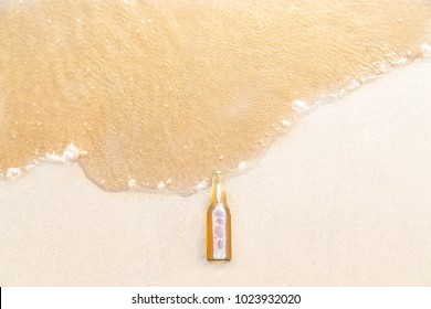 Bottle Of Beer Splash Spill Out To Become The Sea As Creativity Or Advertising